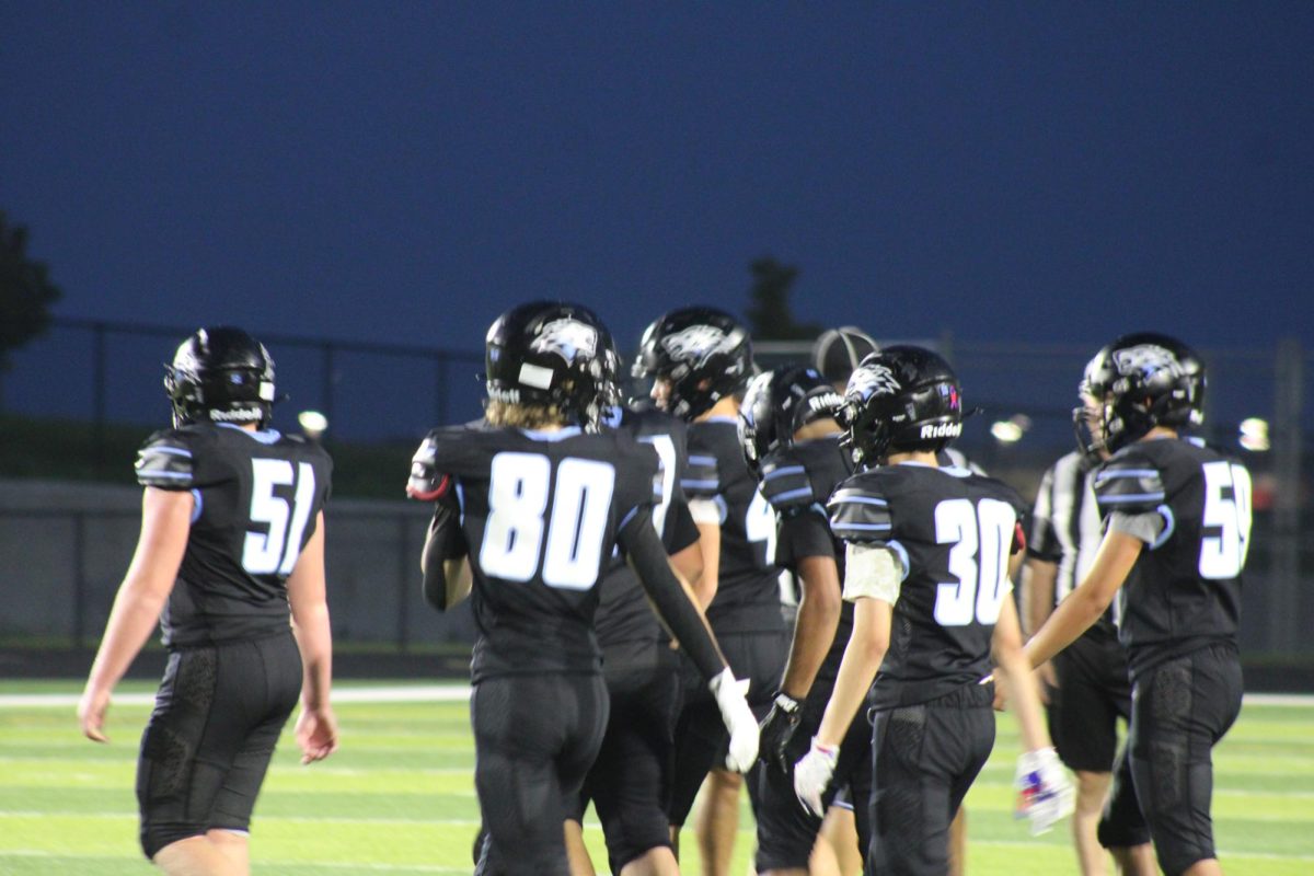 The Wolves take the field after the end of the 3rd quarter. Every play the wolves strive for success. 