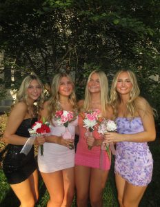 Juniors Ava Fanoele, Gabby Rowe, Mady Peasinger, and Skyler Vandenberg posed for a picture before homecoming. 