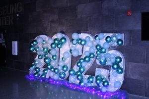 This picture is of a decoration at Elkhorn Norths prom in 2025. As everyone walked into the gym they saw this sign and it was used for many photos throughout the night. Photo by Olivia Cemer.