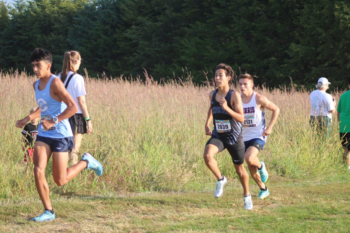 Rieck races against other schools during the meet. He was half way through the course.