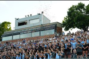 Elkhorn North student section celebrates the Wolves first touchdown at the homecoming game. On September 12, 2025 the Wolves beat Ralston High school 56-21. Photo courtesy of Renee Vokt.
