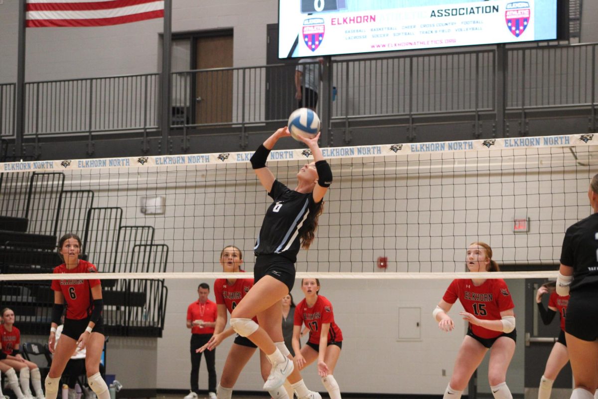 Senior Hayden Booth (6) setting the ball to her teammate, Reagan Wallraff (9) to spike the ball over the net. Booth set a lot of plays similar to this, which scored multiple points for the Wolves at their game against Elkhorn High on August 28th, 2025.