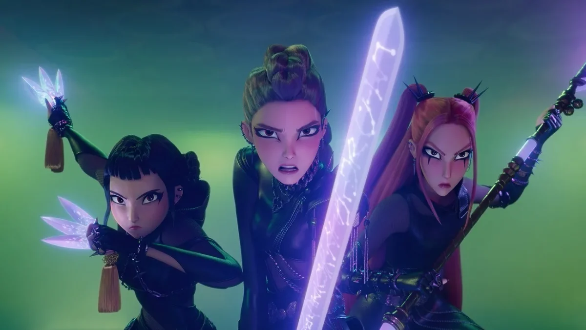 Rumi, Zoey, and Mira prepare to fight the Saja Boys. The trio had to balance their music career and defeating demons. Photo courtesy of Netflix.