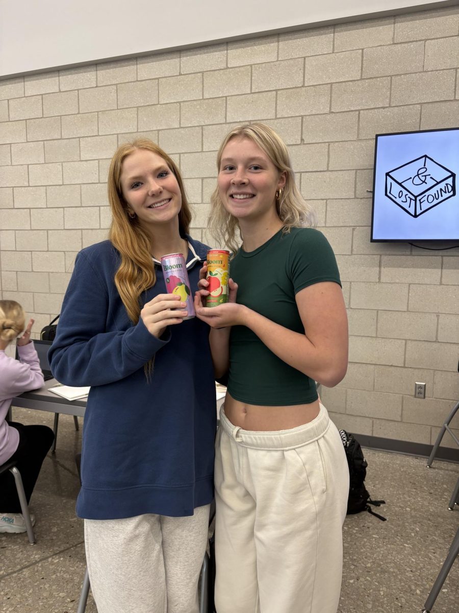 Junior Addy Bratt and sophomore Payton Palmer drink their energy drinks in third period. It helped to energize them for the remaining school day.
