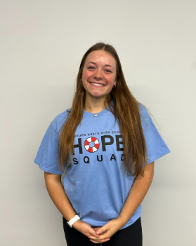 Loghan Evert is apart of Hope Squad at Elkhorn North. She posed for a picture to be put on a google slide that showcased fun facts about her. Photo courtesy of Trenton Nolan.