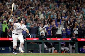 Seattle Mariner’s catcher Cal Raleigh hits a homerun against the Colorado Rockies. With this hit he is the first catcher in MLB history to have 60 homeruns in a single season. Photo courtesy of Las Angeles Times