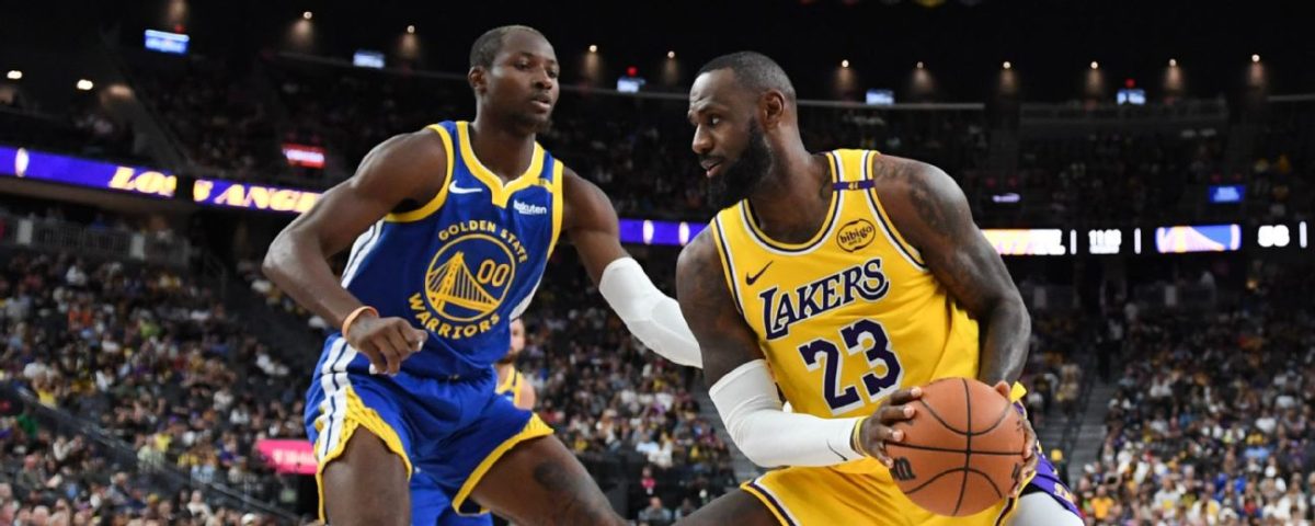 Jonathan Kuminga defends Lebron James. Photo courtesy of ESPN.