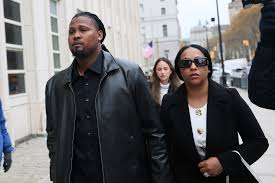 Luis Ortiz walking to his New York court appearance. He is accused of allegedly taking bribes and interfering with bets. Photo courtesy of Nick Cammett of Getty Images. 