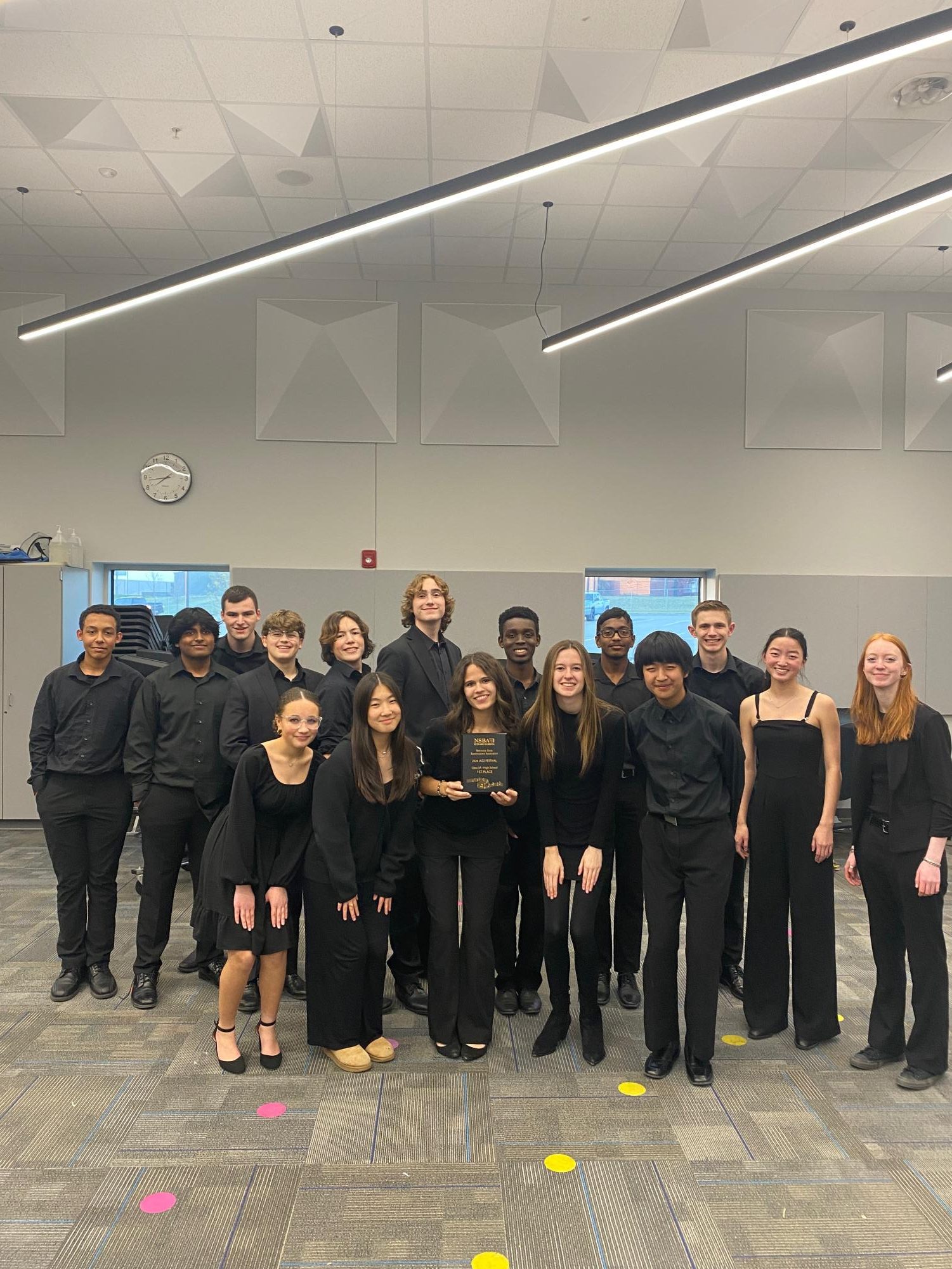 Big Band Wolves poses with their first place plaque. Members performed at Elkhorn South High School where they also received received a superior rating. Photo by Evan Olijnek.