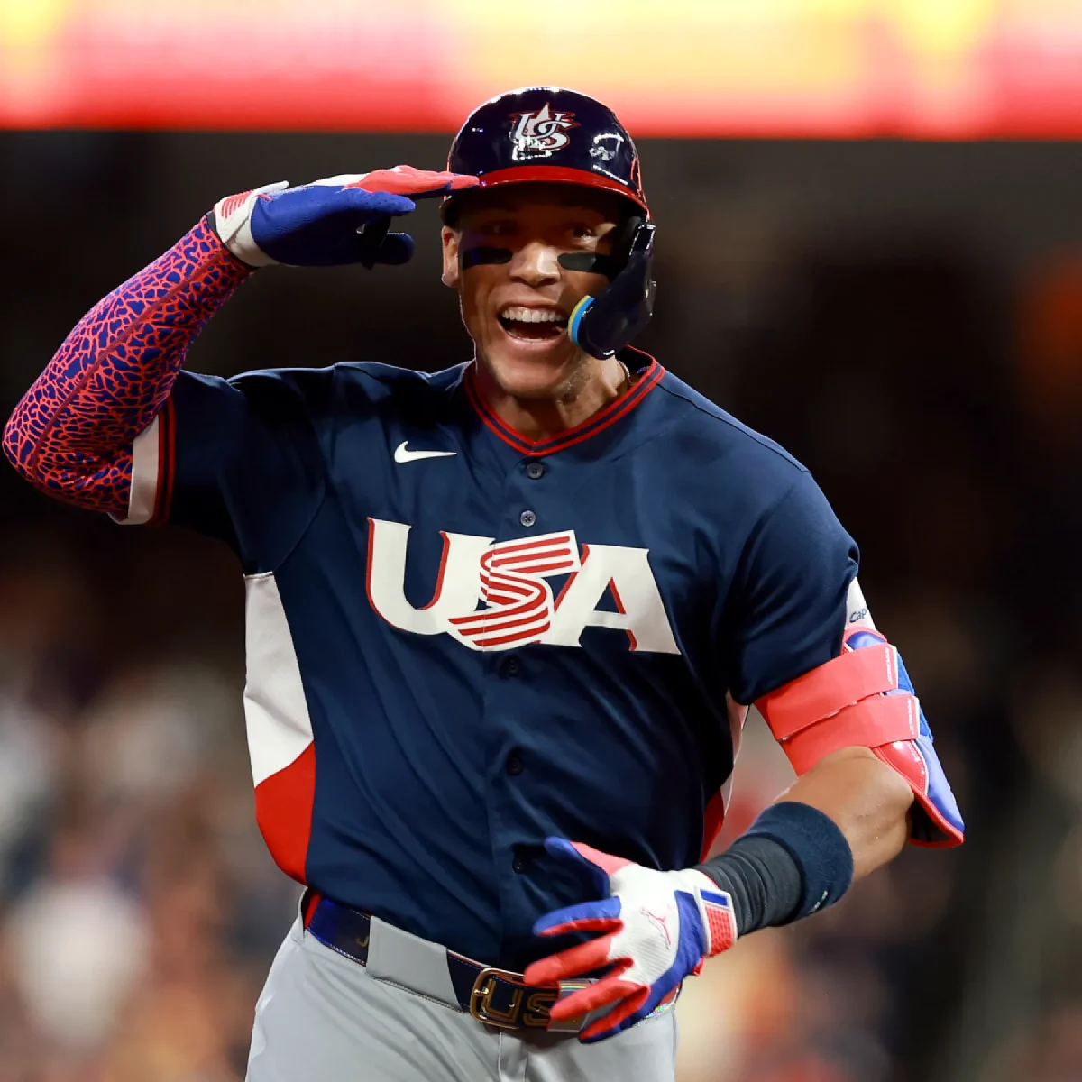 Aaron Judges celebrates before rounding third base by saluting the USA dugout. This 2 run home run helped the USA team add to their lead against Brasil on the way to their WBC opening round win. Photo courtesy of the Chicago Tribute.