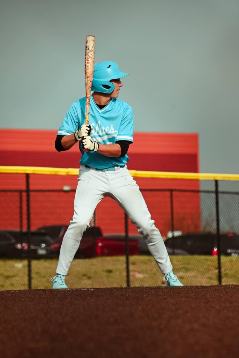 Sophomore Connor Wurdeman in the box waiting for the pitch. Wurdeman got a single on this at-bat which led to a walk-off run to be scored. Photo Courtesy of Kingston McNeal